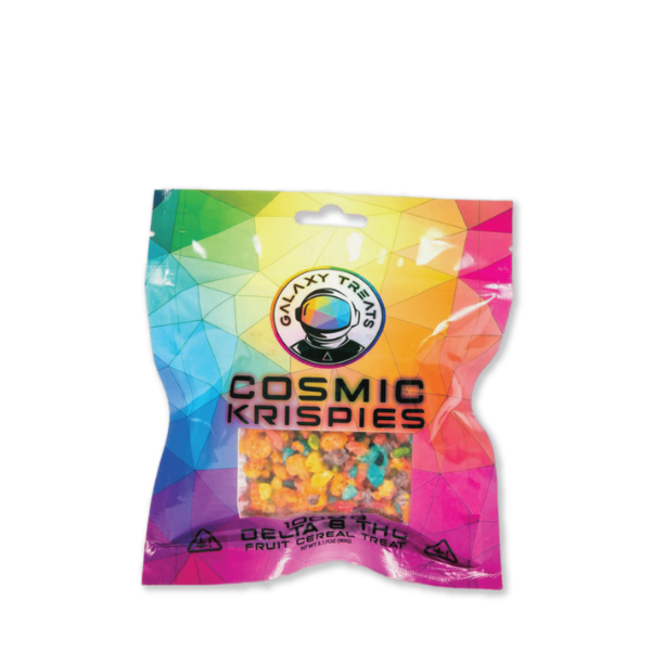 A colorful package of Galaxy Treats Cosmic Krispies, with a transparent window showing cereal-shaped items inside. The package is adorned with vibrant, space-themed graphics.