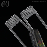 Close-up of a coil with a rainbow handle on a black background, featuring the 'Coil Clout' brand.