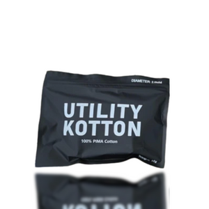 Black package of Utility Kotton cotton on a white background