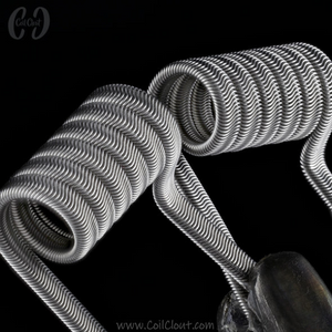 Close-up of coiled spring with 'Coil Clout' branding on a black background